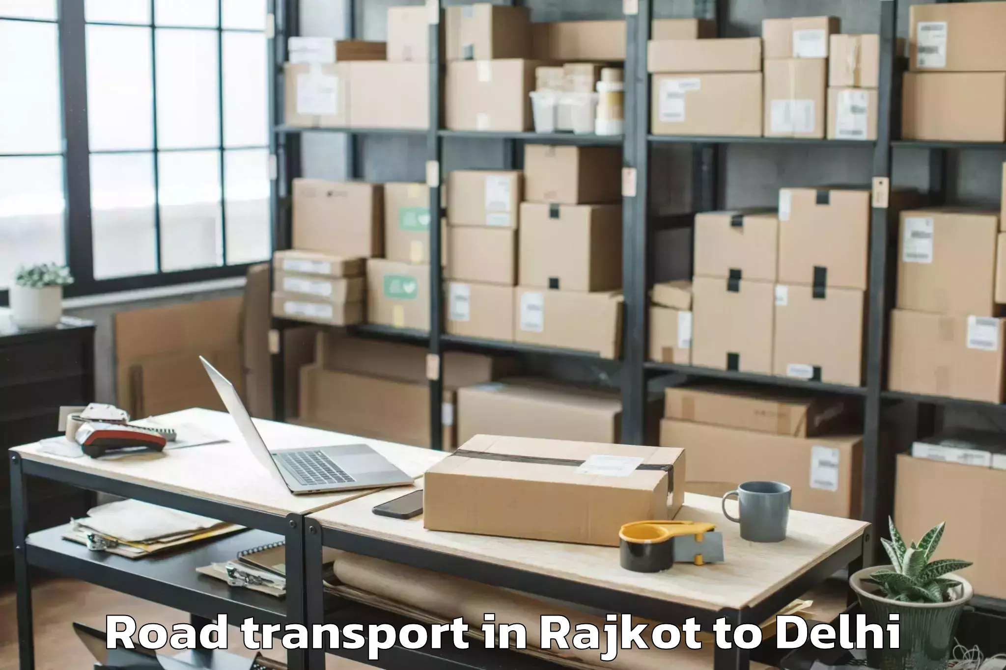 Get Rajkot to Flatted Factory Complex Okhla Road Transport